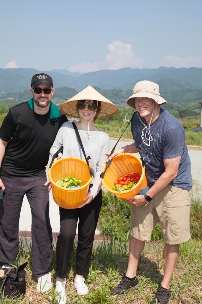 Students in the field with vegetables